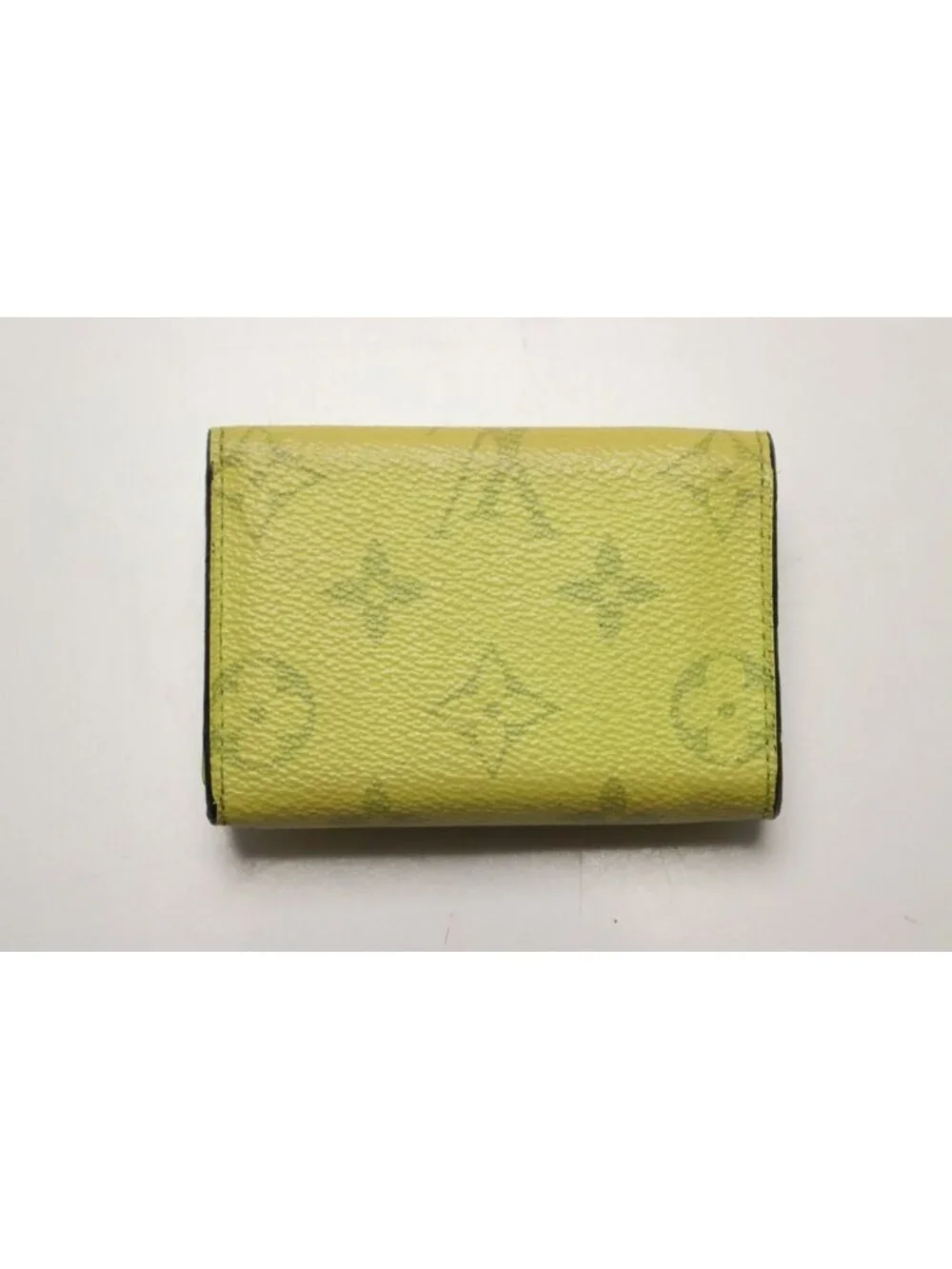Louis Vuitton Taigarama Discovery Compact Leather Trifold Wallet